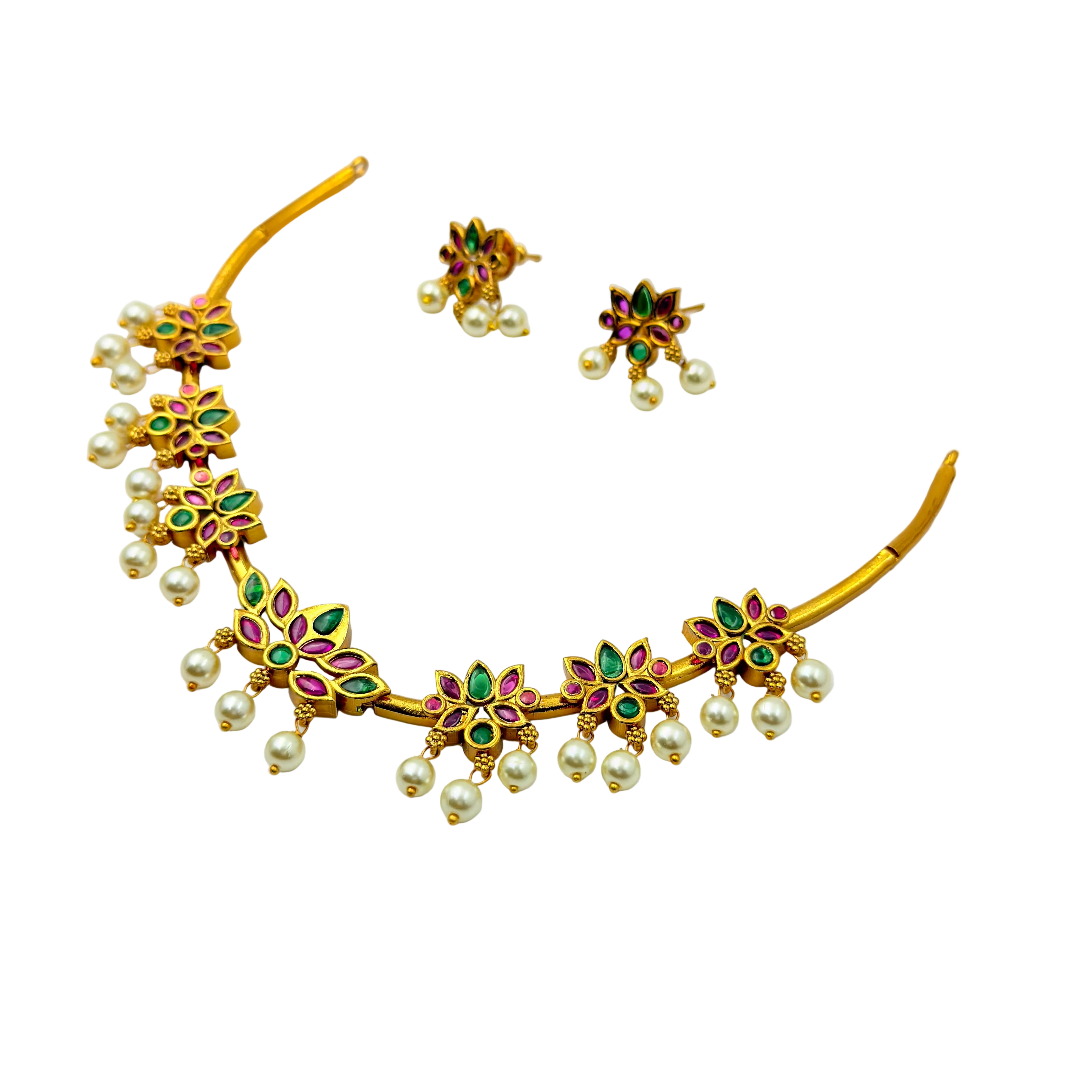 Gold necklace with pearls and gemstones on a white background