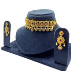 Gold vintage floral choker necklace and drop earrings with ruby and emerald stones, angled display view