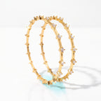 Gold Prismatic Bangle — studio hero view, Krystal Jewels