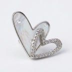 KJ-AI-GALLERY-v1 | Iridescent Double Heart Earrings — macro detail | Krystal Jewels