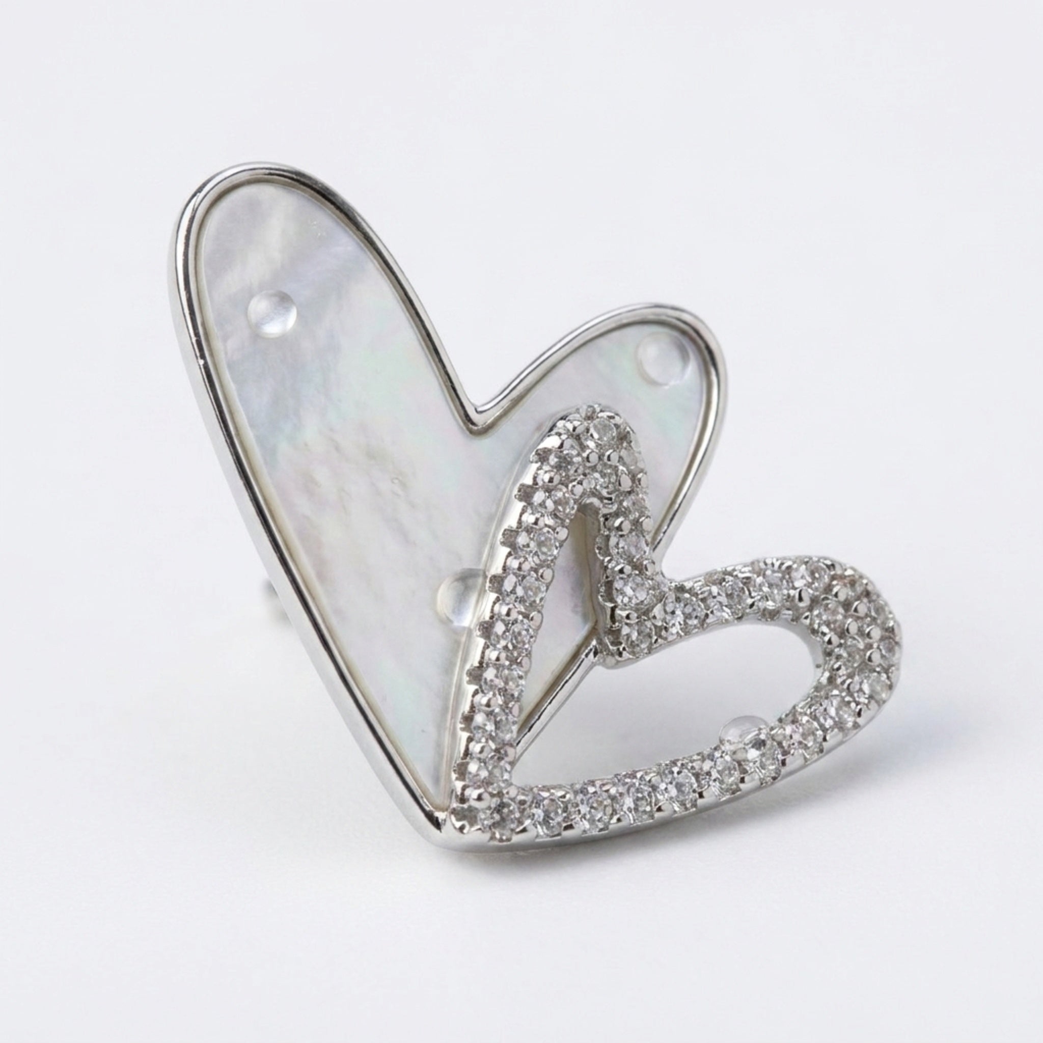 KJ-AI-GALLERY-v1 | Iridescent Double Heart Earrings — macro detail | Krystal Jewels