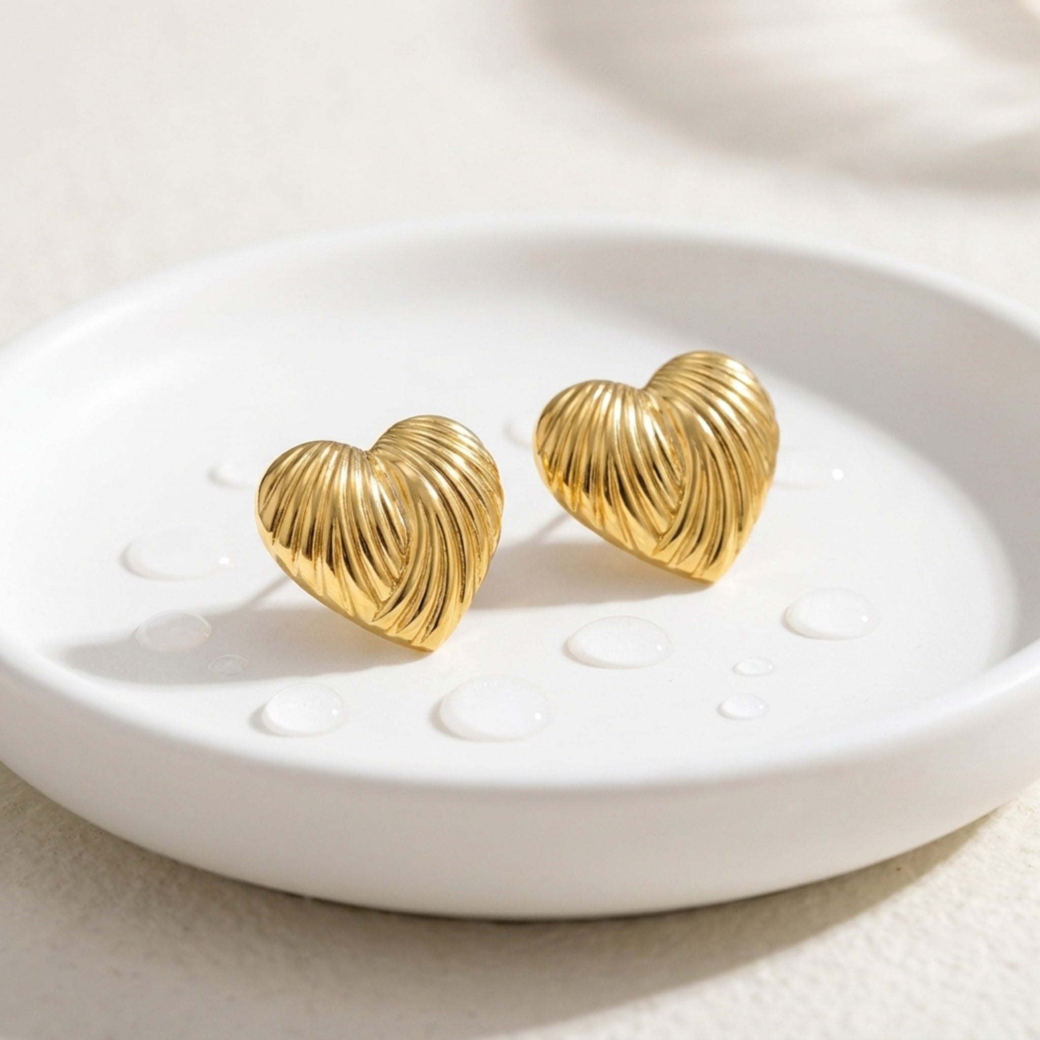 KJ-AI-GALLERY-v1 | Ribbed Heart Earrings — occasion scene | Krystal Jewels