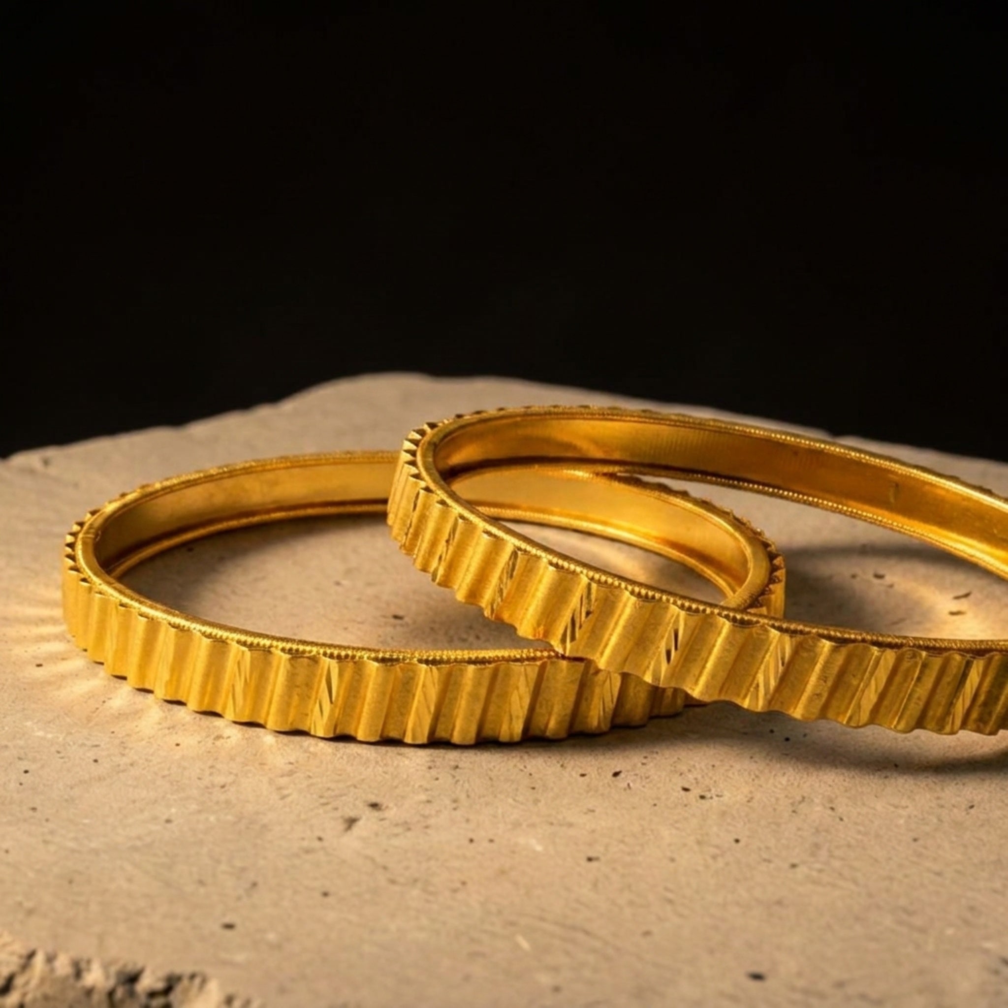 KJ-AI-GALLERY-v1 | Royal Ridge Gold Bangle Set — styled flat-lay | Krystal Jewels