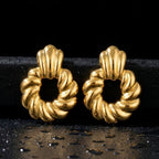 KJ-AI-GALLERY-v1 | Sculptural Ribbed Wreath Earrings — styling flat-lay | Krystal Jewels