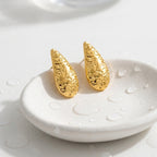 KJ-AI-GALLERY-v1 | Textured Crescent Moon Studs Earrings — occasion scene | Krystal Jewels
