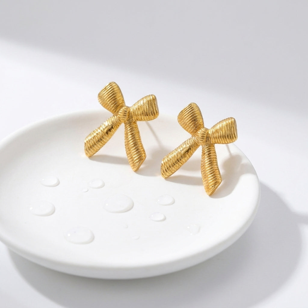 KJ-AI-GALLERY-v1 | Textured Ribbon Bow Earrings — occasion scene | Krystal Jewels