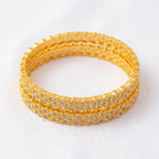KJ-AI-GALLERY-v1 | Zirra Luxe Bangles — styling flat-lay | Krystal Jewels