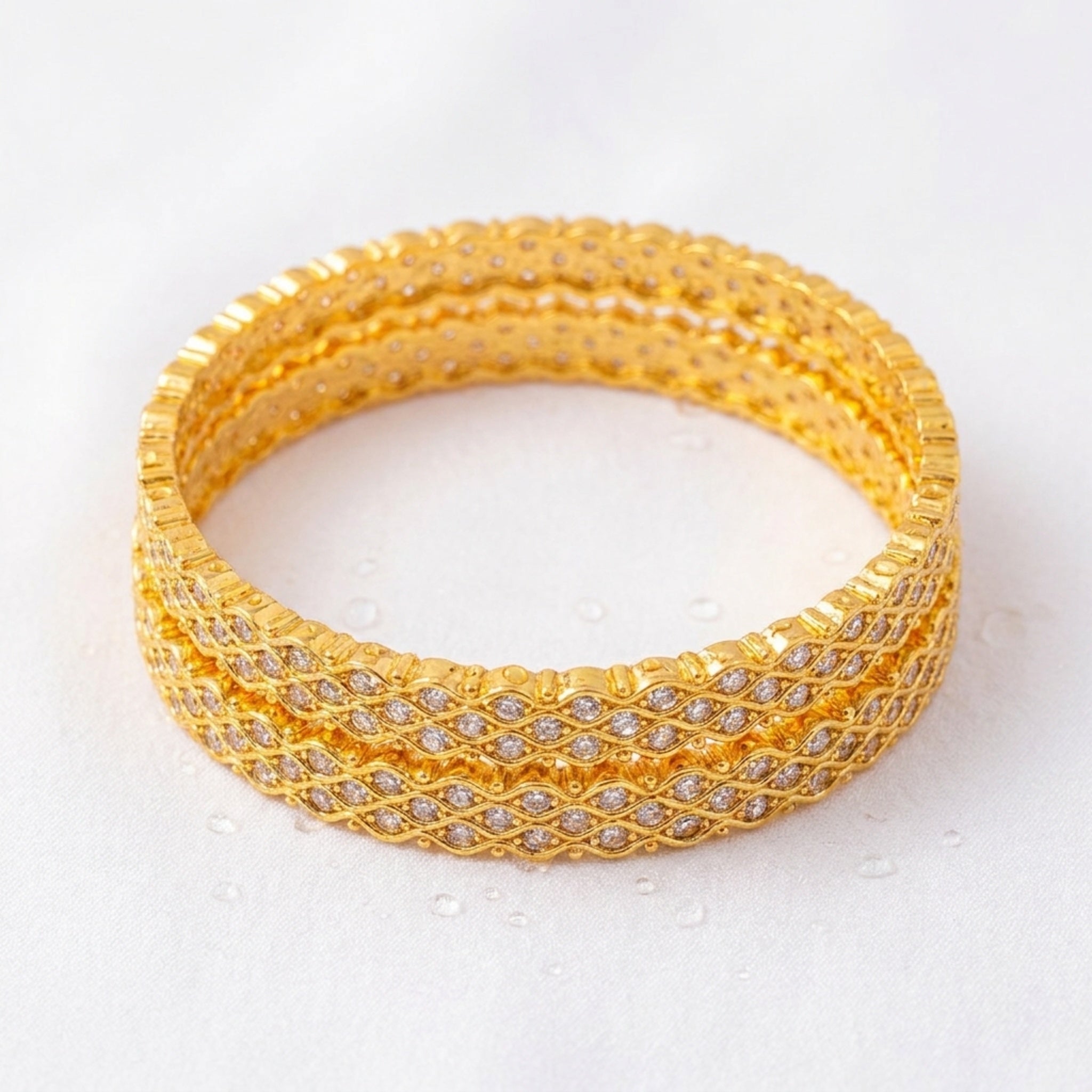 KJ-AI-GALLERY-v1 | Zirra Luxe Bangles — styling flat-lay | Krystal Jewels